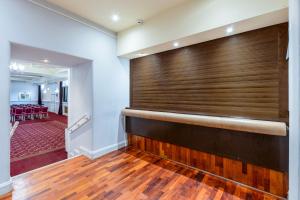 a view of the back of a rec room with a wall at Bournemouth Carlton Hotel By Sunday in Bournemouth