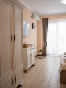 a room with a bedroom with a bed and a cabinet at Hotel Boutique Casa Venusian in Venus