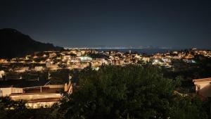 a view of a city at night at Casa delle Campane in Scala