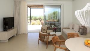 a living room with a couch and a table at Villa Zeno in Tragána