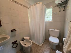 a bathroom with a toilet and a sink at Inés in Tijarafe +11 photos