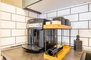 a coffee maker on a counter in a kitchen at Altstadt Quartier in Bad Freienwalde