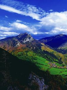 a view of a mountain with a town in a valley at Chalupa Magdaléna in Terchová