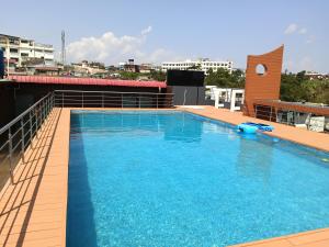 a large swimming pool on the roof of a building at Borbon Hotel & Restaurant in Jowai