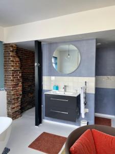 a bathroom with a sink and a mirror at Thorn BenB in Thorn +38 photos