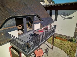 an overhead view of a balcony of a house at Wohnen am Weingut - Auf dem Ausguck in Briedel