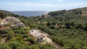 an aerial view of a village with the ocean at Villa Mimoza Apelati in Keri