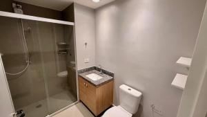a bathroom with a shower and a toilet and a sink at Today Perdizes São Paulo - Allianz Parque in São Paulo