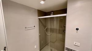 a shower with a glass door in a bathroom at Today Perdizes São Paulo - Allianz Parque in São Paulo
