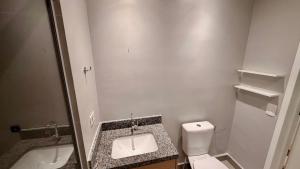 a small bathroom with a toilet and a sink at Today Perdizes São Paulo - Allianz Parque in São Paulo