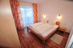 Letto o letti in una camera di Haus Scheiber