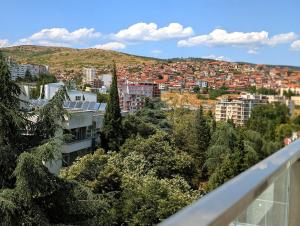 a view of a city from a balcony at Panorama Sunset Studio in Stara Zagora