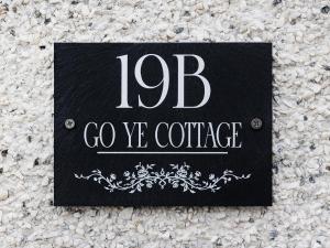 a sign that says bc goye conference at Go Ye Cottage in Leurbost