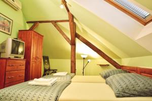 Posteľ alebo postele v izbe v ubytovaní Barock Restaurant & Pension