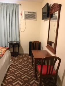 Photo de la galerie de l'établissement Waterbury Big Apple Motel, à Waterbury 18 autres photos