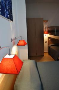 Postel nebo postele na pokoji v ubytování Hotel Cala Luna