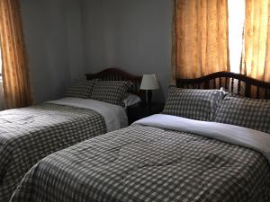 Postel nebo postele na pokoji v ubytování La Gran Fortaleza B&B