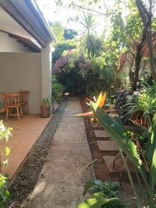 a garden outside a house with a patio at My Serenity Guesthouse in Mokopane