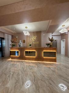 a lobby of a hotel with a reception desk at Alemar Mamaia Nord in Năvodari +59 photos