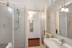 a bathroom with a shower and a sink at Casa Lena in Arma di Taggia +13 photos