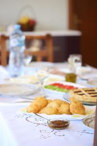 a table with plates of food on top of it at A&B Berat in Berat