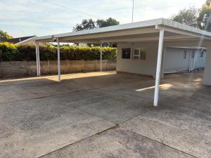 a garage with awning in front of a building at 47 on Cleland in Pietermaritzburg
