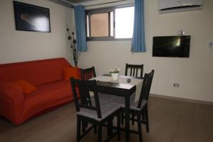Posezení v ubytování Nemi rooms