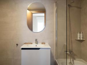 a bathroom with a sink and a shower at Meral Units in Fuengirola +35 photos