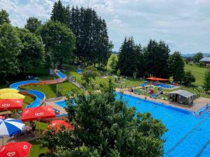 an amusement park with a water park with a water slide at Moderne Ruheoase Allgäu in Oberreute