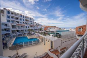 a view of the pool from the balcony of a hotel at CASA VARGAS-TENERIFE in Los Cristianos