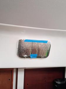 a suitcase is sitting on top of a shelf at Resort chic on the water! in Key West