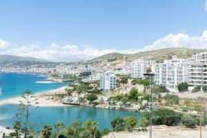 a view of a city and a body of water at Erdeti Boutique Hotel in Sarandë