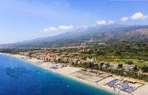 an aerial view of a resort on the beach at Sicilia Mount&Sea in Mascali