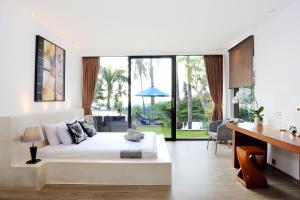 Llit o llits en una habitació de Villa Tiara 50 fotos més