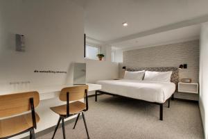 Postel nebo postele na pokoji v ubytování Hotel Hive