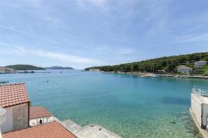 a view of a river from a building at Apartment Mirni by the sea in Prvić Luka +12 photos
