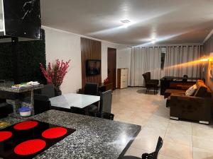 a living room with a couch and a table at Smart & Comfort 4 - Ap completo in Campina Grande