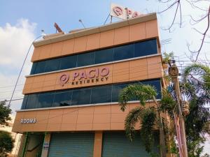 a building with a sign on top of it at Pacio Residency in Kanchipuram