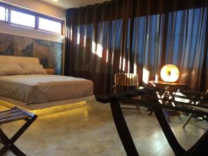 Hotel Casa Maya Calakmul客房内的一张或多张床位