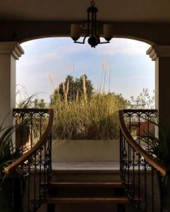 a view from the porch of a house at XTILU Hotel - Adults only - in Oaxaca City +22 photos