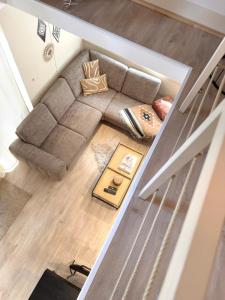 an overhead view of a living room with a couch at Wonderwild C79, Dog Friendly in Lanaken