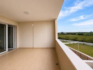 a balcony with a view of a field at Casa Mamma Etna in Riposto