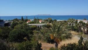 a view of the ocean from a hill at Sky Eye Studios in Kokkini Khanion