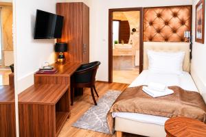 Katil atau katil-katil dalam bilik di Simbad Hotel & Bar Superior