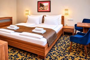Katil atau katil-katil dalam bilik di Simbad Hotel & Bar Superior