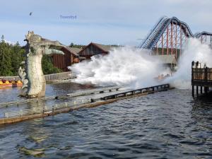a dragon roller coaster on the water at the water park at Oslofjord Sea View in Hvitsten
