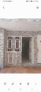 a rendering of a room with white doors at Lindo apartamento Girón in Girón
