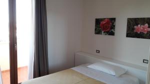 Postel nebo postele na pokoji v ubytování Park Hotel San Michele