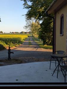 a view of a road with a table and a fire hydrant at Nygård Apartments in Klagstorp