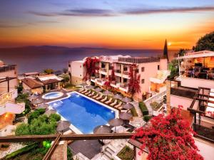 an aerial view of a resort with a swimming pool at Olympion Sunset Halkidiki in Fourka
